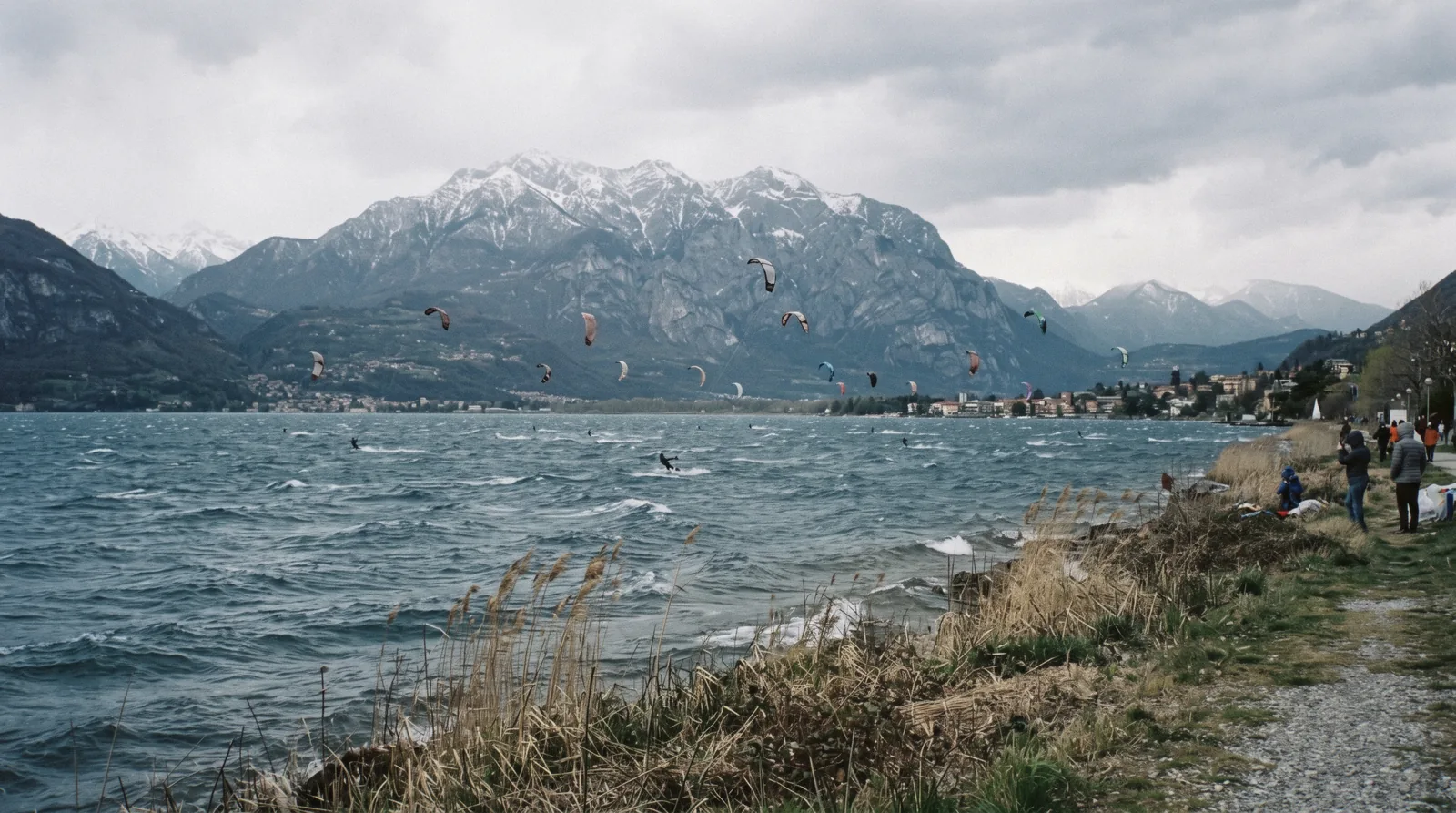 Kitesurfers on the wide northern basin at Colico under the Alps, Lake Como