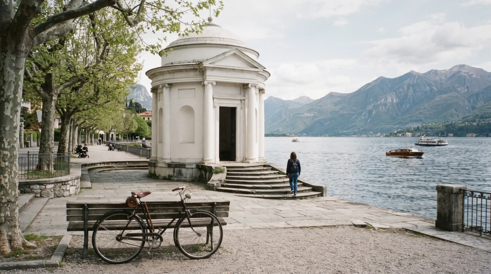 The white domed rotunda of the Tempio Voltiano on the Como lakefront with the mountains behind it, Tempio Voltiano museum on Lake Como