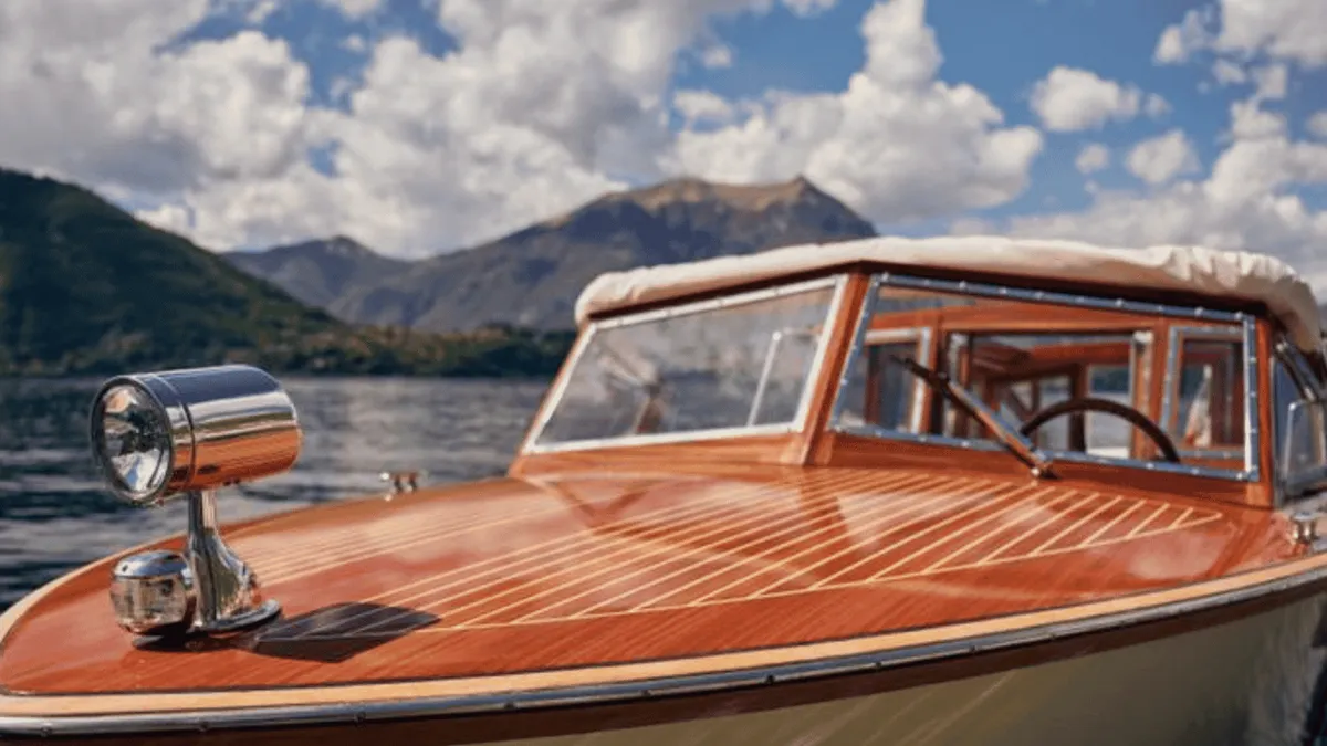 Venetian taxi boat on Lake Como at sunset off Bellagio
