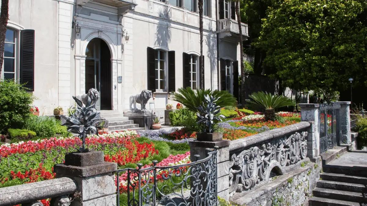 Lakeside botanical garden and colonnade at Villa Monastero in Varenna, Lake Como