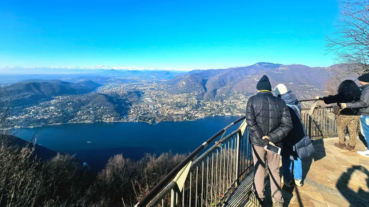Brunate funicular climbing above Como with Lake Como spread out below