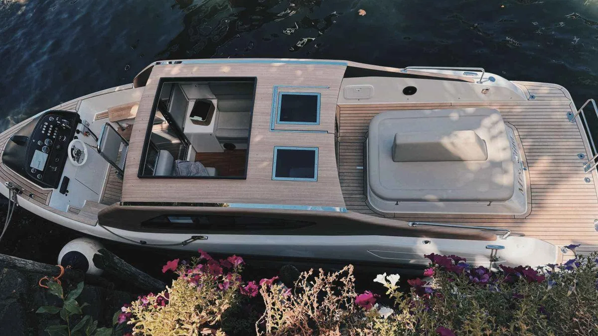 Limousine tour boat moored at Varenna during a Lake Como cruise from Como