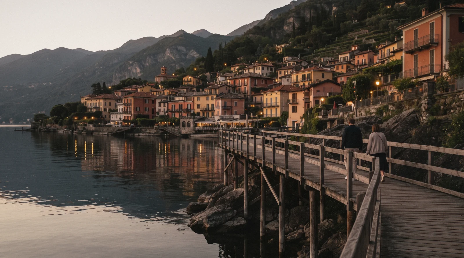 The walkway on stilts along the water at Varenna in evening light, Lake Como